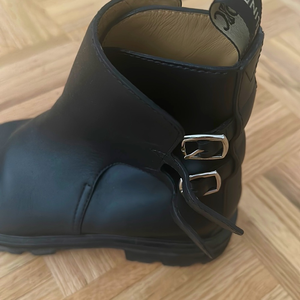Never worn black Celine ankle boots with two straps on the left side of the boot